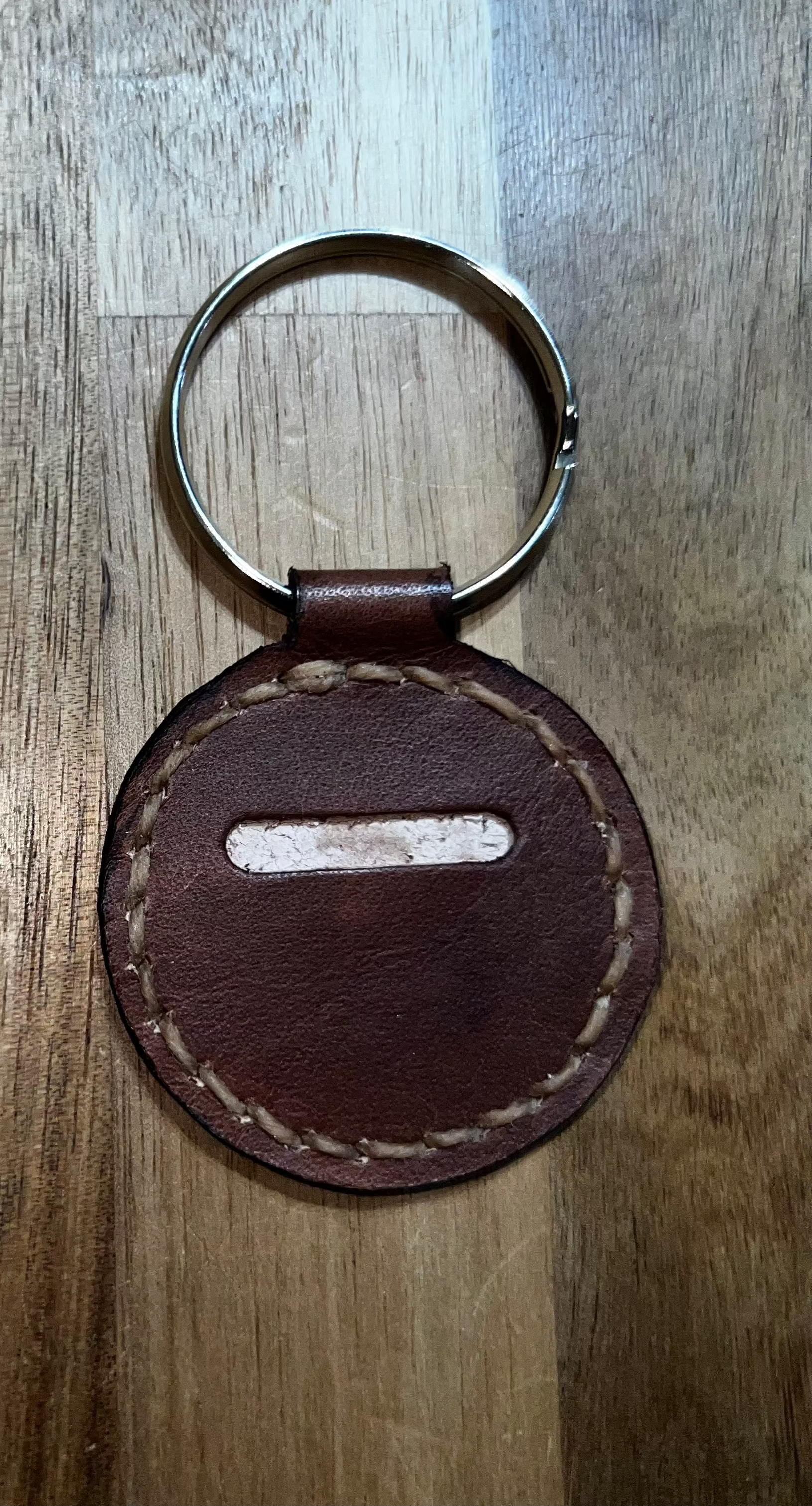 Coin keychain round brown back