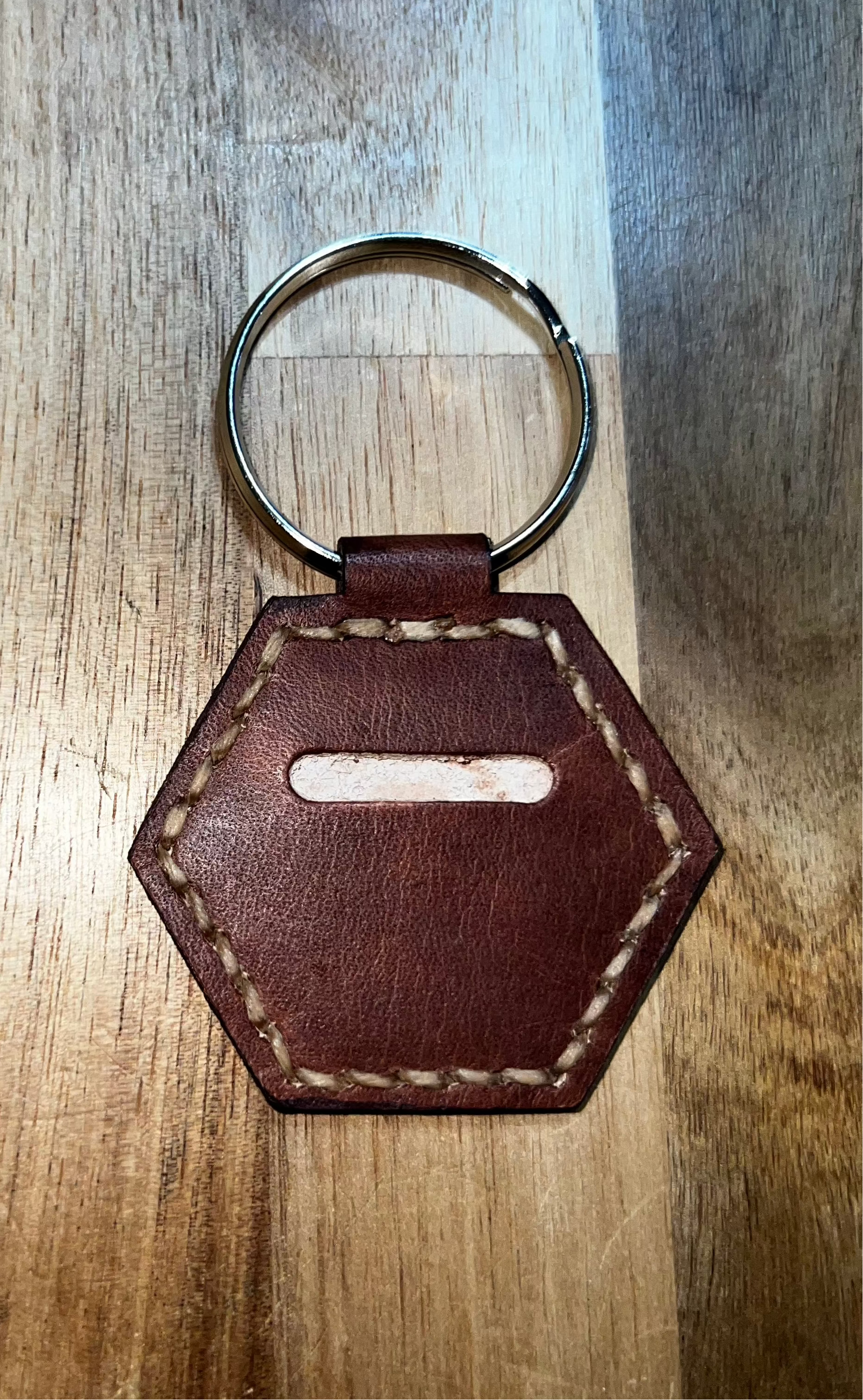 Haxagonal Keychain with slot for coin